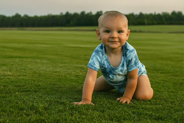 Child playing on fresh Sodmasters sod