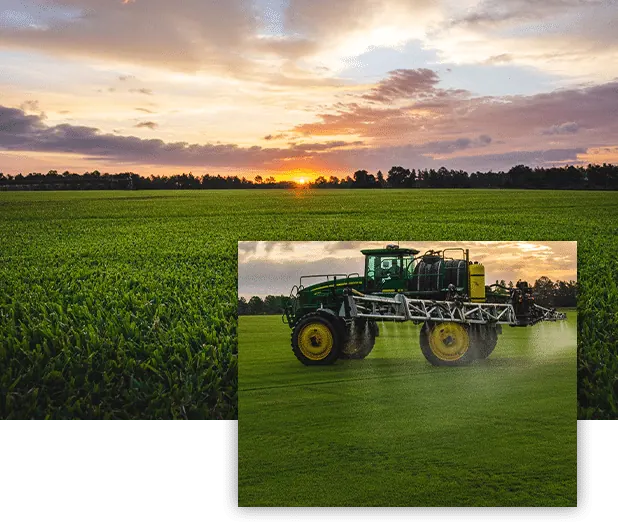 Sprayer working a Sodmasters sod field at sunset
